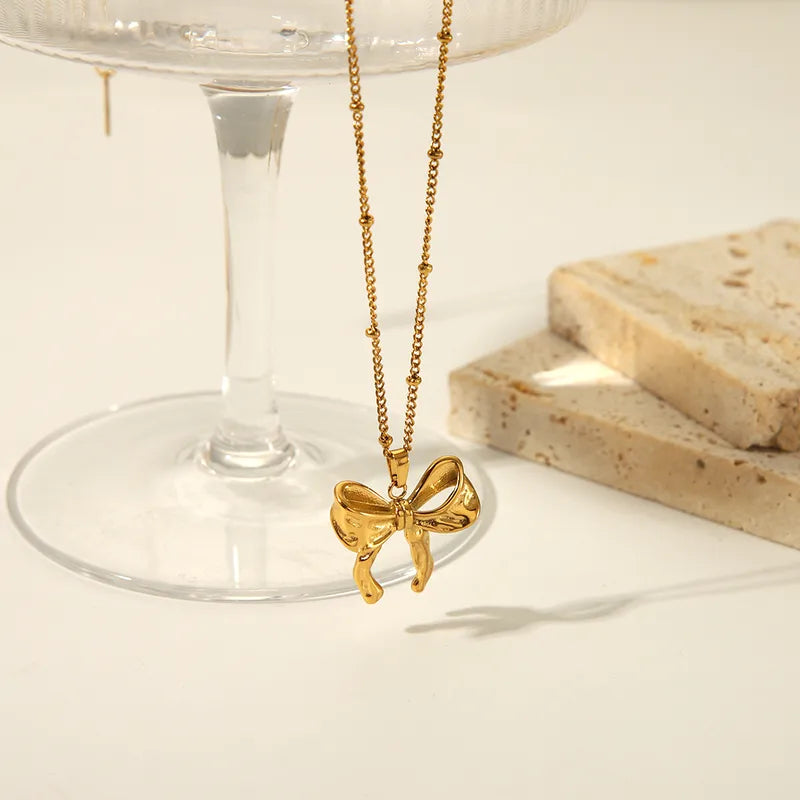 Coquette Pearl Bow Necklace